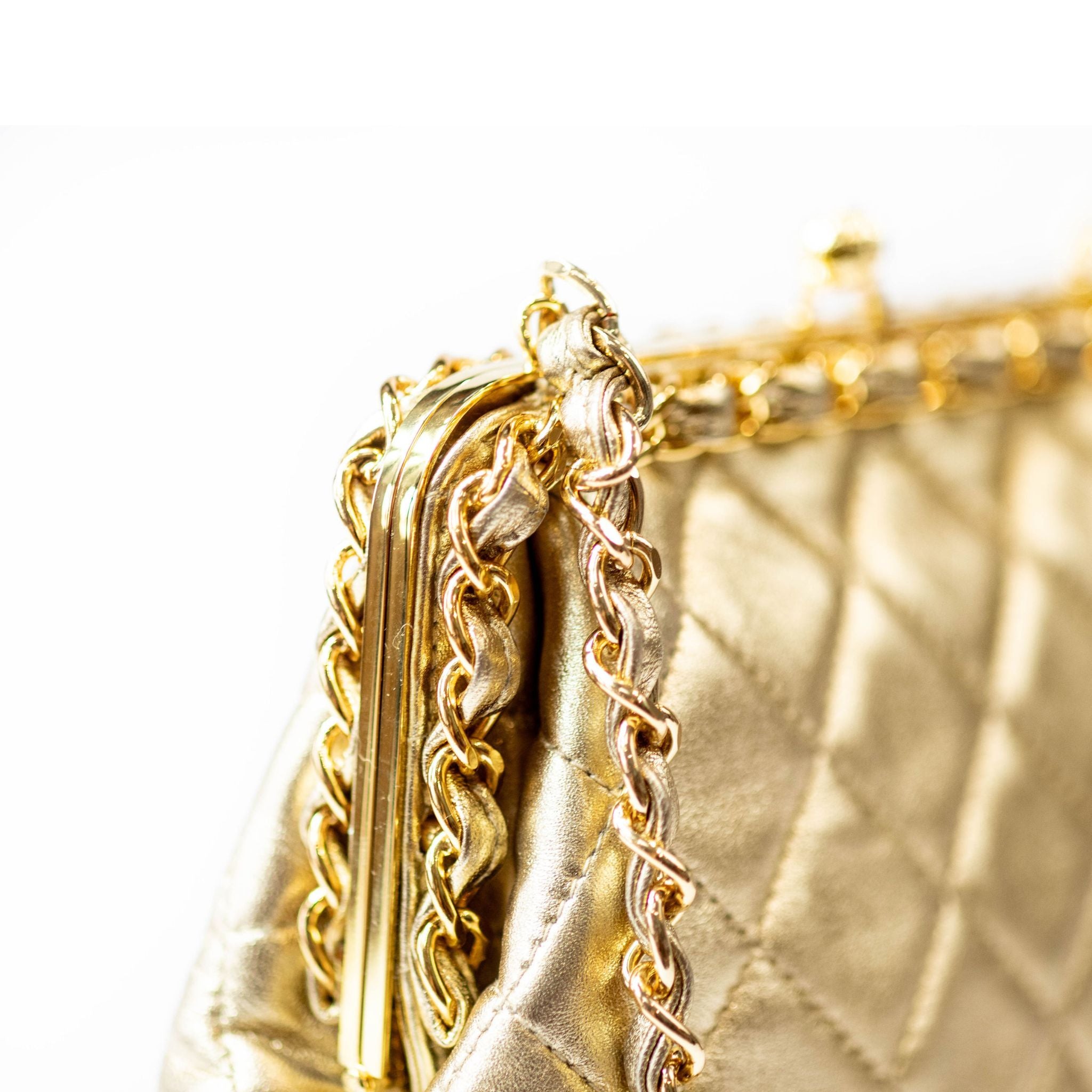 CHANEL Gold Lambskin Kisslock Clutch - 1994 - 1996