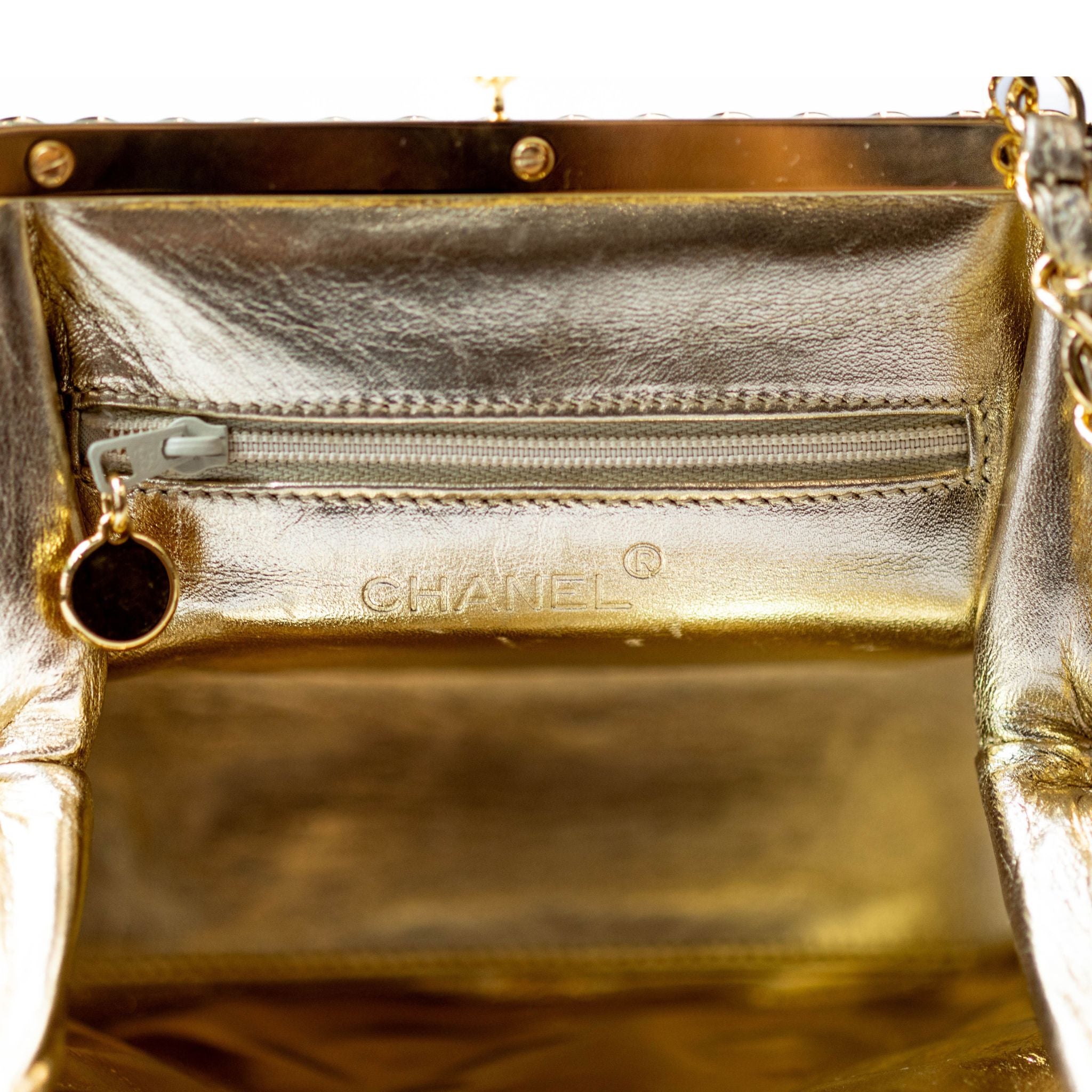 CHANEL Gold Lambskin Kisslock Clutch - 1994 - 1996